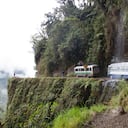Bus van support vehicle driving for mountain bikers on 'the World's most dangerous road' down to Coroico in the Yungas, La Paz province, Bolivia. (Photo by Phil Clarke Hill/In Pictures/Corbis via Getty Images)