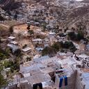 Sprawling settlements of poor housing on the outskirts of Port-au-Prince, Haiti. Population pressure has forced people to build further and further up the hill away from the coastline. This is very dangerous, as rainstorms can cause flooding and the collapse of such areas.
