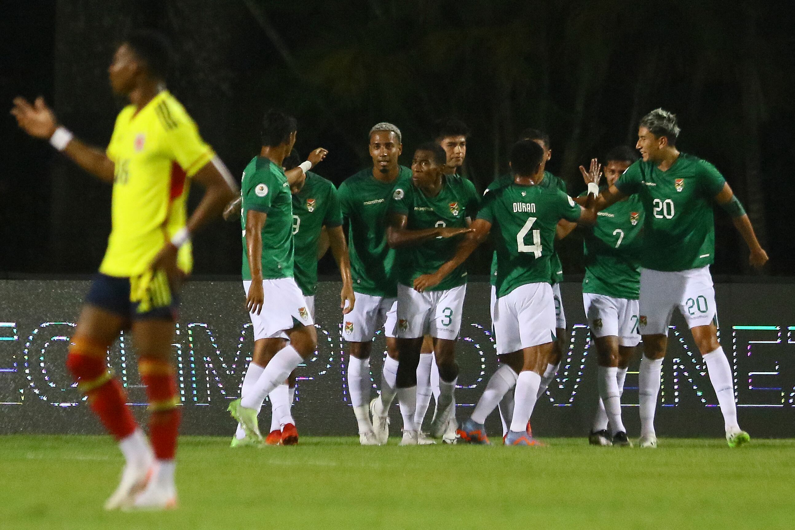 Bolivia's forward Jose Brice�o (3-L) celebrates with teammates after scoring a goal during the Venezuela 2024 CONMEBOL Pre-Olympic Tournament Group A football match between Colombia and Venezuela at the Misael Delgado stadium in Valencia, Venezuela on February 1, 2024. (Photo by Juan Carlos Hernandez / AFP)