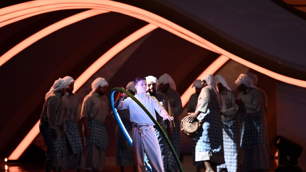 DOHA, QATAR - APRIL 01: Performers dance during the FIFA World Cup Qatar 2022 Final Draw at the Doha Exhibition Center on April 01, 2022 in Doha, Qatar. (Photo by Shaun Botterill/Getty Images)