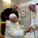 VATICAN CITY, VATICAN - AUGUST 27: Pope Francis greets Pope Emeritus Benedict XVI during a meeting with newly named Cardinals at the Vatican's Mater Ecclesiae Monastery on August 27, 2022 in Vatican City, Vatican. Pope Francis on August 27, 2022 presided a consistory for the creation of 20 new Cardinals, 16 of whom are under the age of 80 and therefore Cardinal-electors in an eventual conclave, plus four who have already reached the age of 80 or will reach it before receiving the red biretta. (Photo by Vatican Media via Vatican Pool/Getty Images)