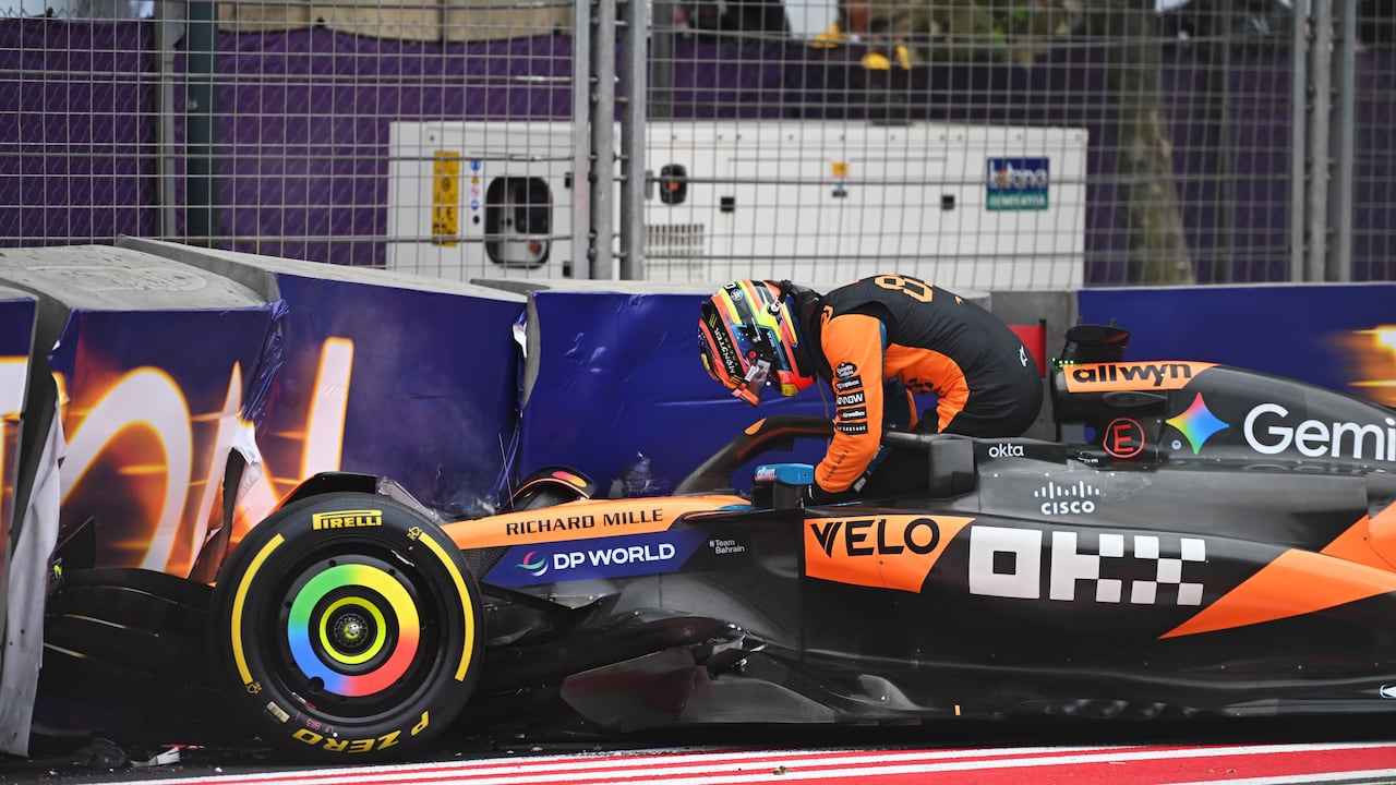 BAKU, AZERBAIJAN - SEPTEMBER 21: Oscar Piastri of Australia and McLaren climbs out of his damaged car after a crash during the F1 Grand Prix of Azerbaijan at Baku City Circuit on September 21, 2025 in Baku, Azerbaijan. (Photo by Rudy Carezzevoli/Getty Images)