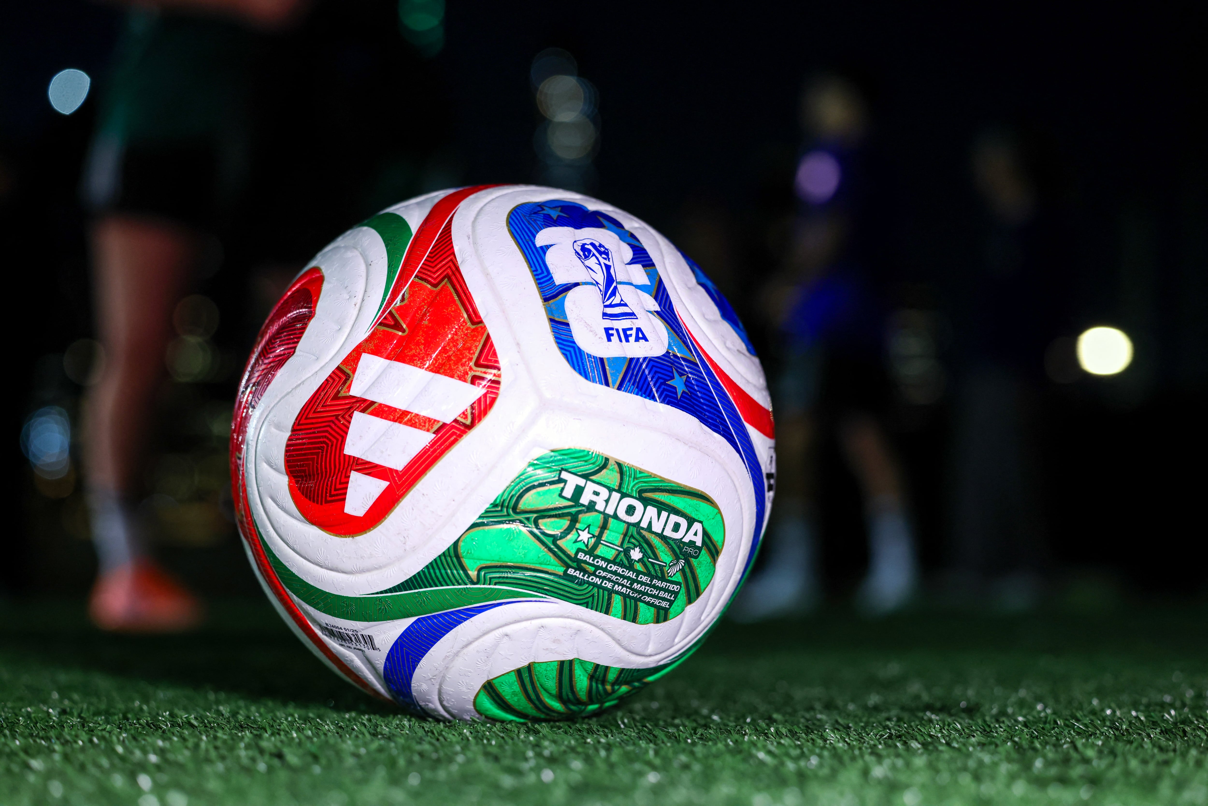 The 2026 FIFA Men's World Cup match ball named Trionda is pictured during its unveiling in New York on October 2, 2025. The 2026 FIFA Men's World Cup is scheduled to take place between June and July 2026, with matches being hosted in Mexico, Canada and the US. (Photo by CHARLY TRIBALLEAU / AFP)
