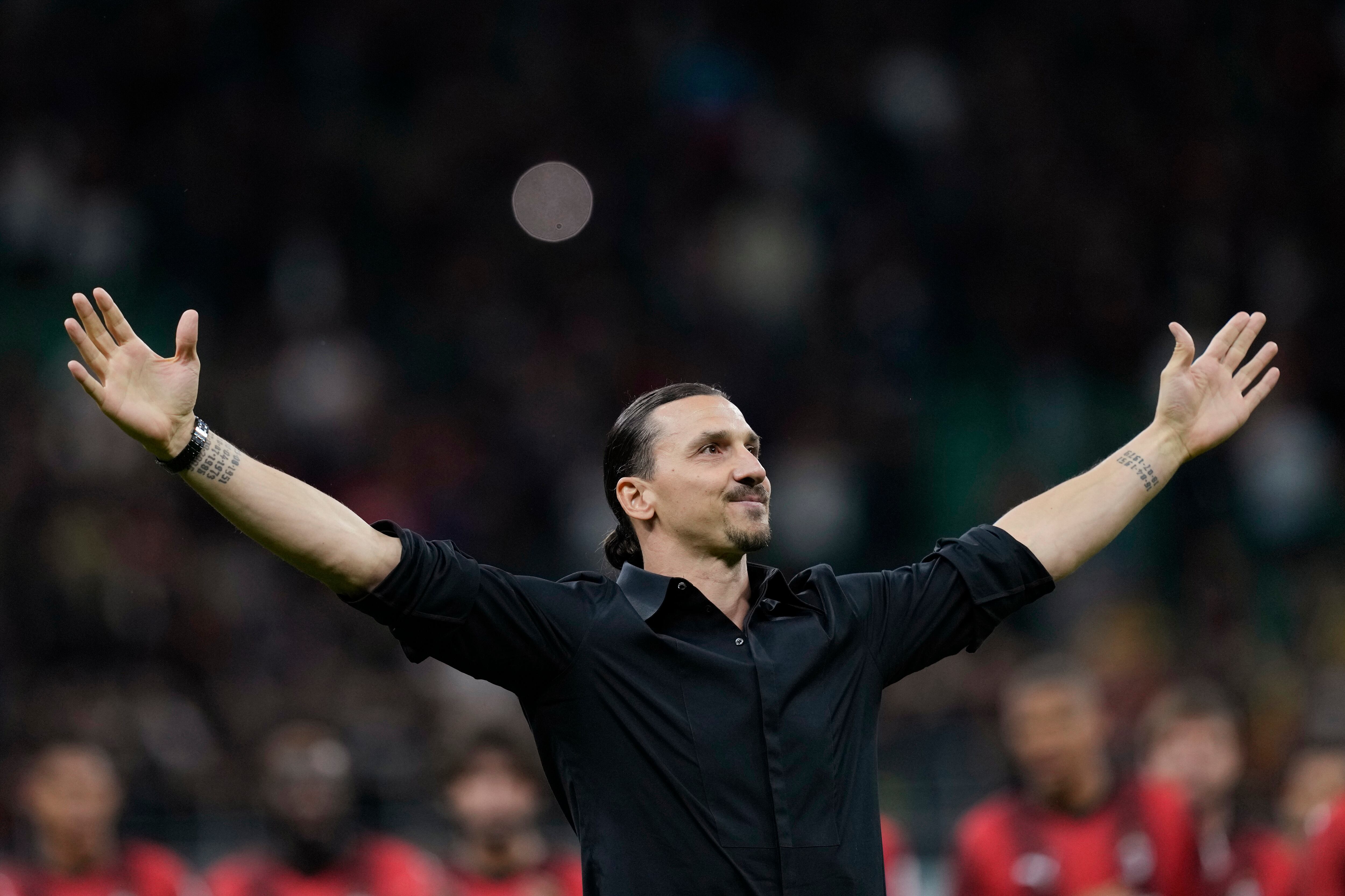 FILE - AC Milan's Zlatan Ibrahimovic reacts after his last game for the club at the end of a Serie A soccer match between AC Milan and Hellas Verona at the San Siro stadium, in Milan, Italy, Sunday, June 4, 2023. A beleaguered AC Milan could be set to call on its talismanic Swede yet again. Zlatan Ibrahimovic officially retired at the end of last season with an emotional speech at San Siro that left many in tears. But during a difficult October Milan has reportedly been in constant contact with the 42-year-old about a potential third spell at the club in an off-the-field capacity. (AP Photo/Antonio Calanni, File)