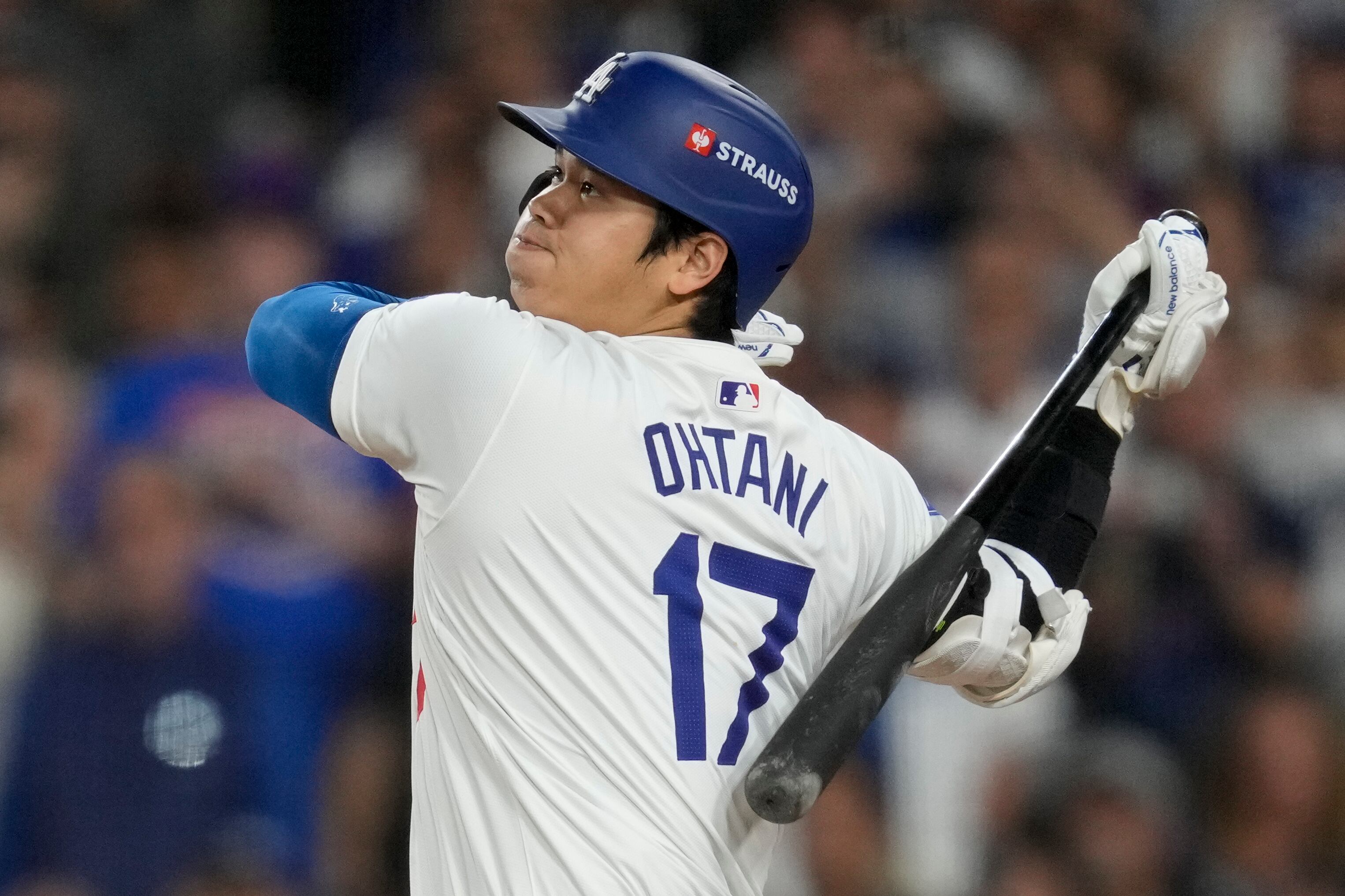Los Angeles Dodgers' Shohei Ohtani celebrates after scoring on a double by Tommy Edman during the first inning in Game 6 of a baseball NL Championship Series against the New York Mets, Sunday, Oct. 20, 2024, in Los Angeles. (AP Photo/Ashley Landis)