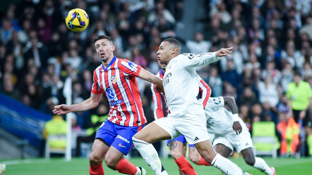 ylian Mbappe R of Real Madrid vies with Clement Lenglet of Atletico de Madrid during the Laliga football match between Real Madrid and Atletico de Madrid, at Santiago Bernabeu Stadium, Madrid, Spain, on Feb. 8, 2025. (Photo by Gustavo Valiente/Xinhua via Getty Images)