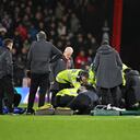 BOURNEMOUTH, ENGLAND - DECEMBER 16: Tom Lockyer of Luton Town (obscured) receives medical treatment after collapsing during the Premier League match between AFC Bournemouth and Luton Town at Vitality Stadium on December 16, 2023 in Bournemouth, England. (Photo by Mike Hewitt/Getty Images)
