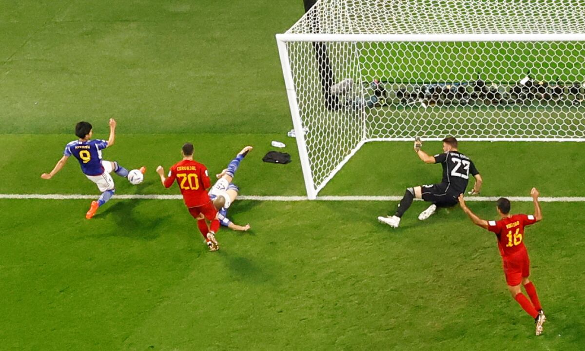 Soccer Football - FIFA World Cup Qatar 2022 - Group E - Japan v Spain - Khalifa International Stadium, Doha, Qatar - December 1, 2022 Japan's Kaoru Mitoma in the action before Ao Tanaka scored their second goal REUTERS/Peter Cziborra