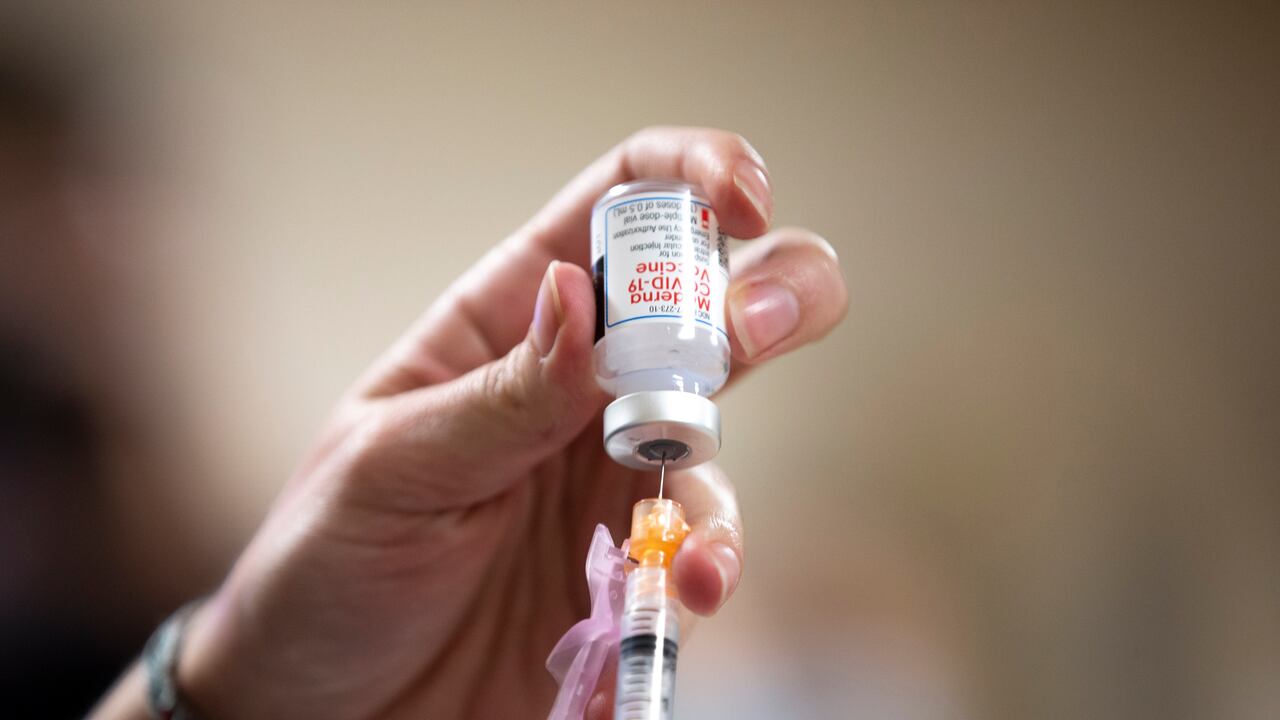 SEATTLE, WA - DECEMBER 21: Colleen D Amico, a clinical pharmacist with Seattle Indian Health Board (SIHB) administers a shot of the Moderna COVID-19 vaccine, to frontline workers at the SIHB on December 21, 2020 in Seattle, Washington. The Seattle Indian Health Board (SIHB) received 500 doses of the FDA-approved Moderna COVID-19 vaccine today. Karen Ducey/Getty Images/AFP.