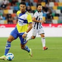 Juventus' Cristiano Ronaldo goes for the ball during the Serie A soccer match between Udinese and Juventus, at the Dacia Arena in Udine, Italy, Sunday, Aug. 22, 2021. (Andrea Bressanutti/LaPresse via AP)
