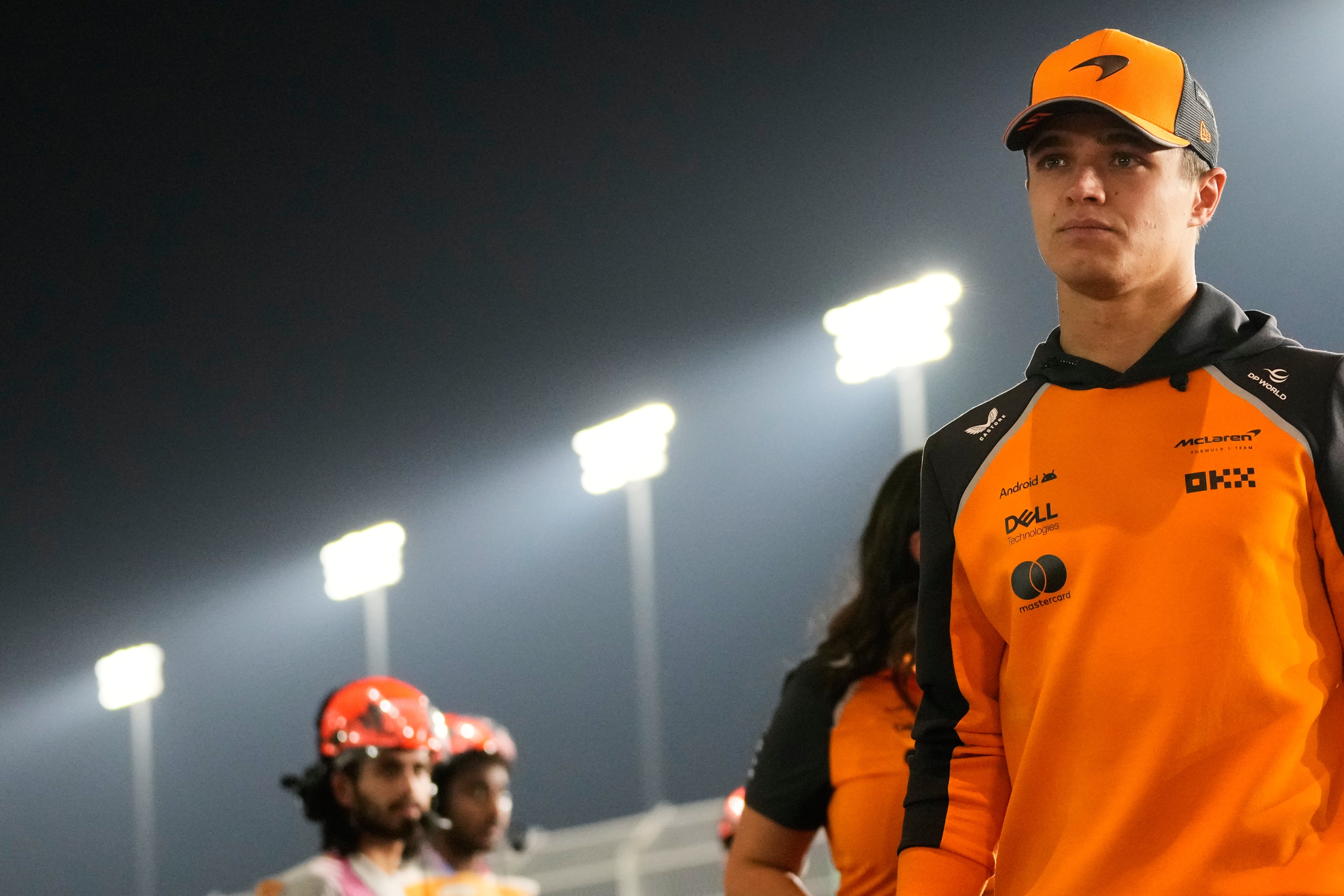 McLaren driver Lando Norris of Britain arrives prior to the Qatar Formula One Grand Prix, at the Lusail International Circuit, in Lusail, Qatar, Sunday, Nov. 30, 2025. (AP Photo/Darko Bandic)