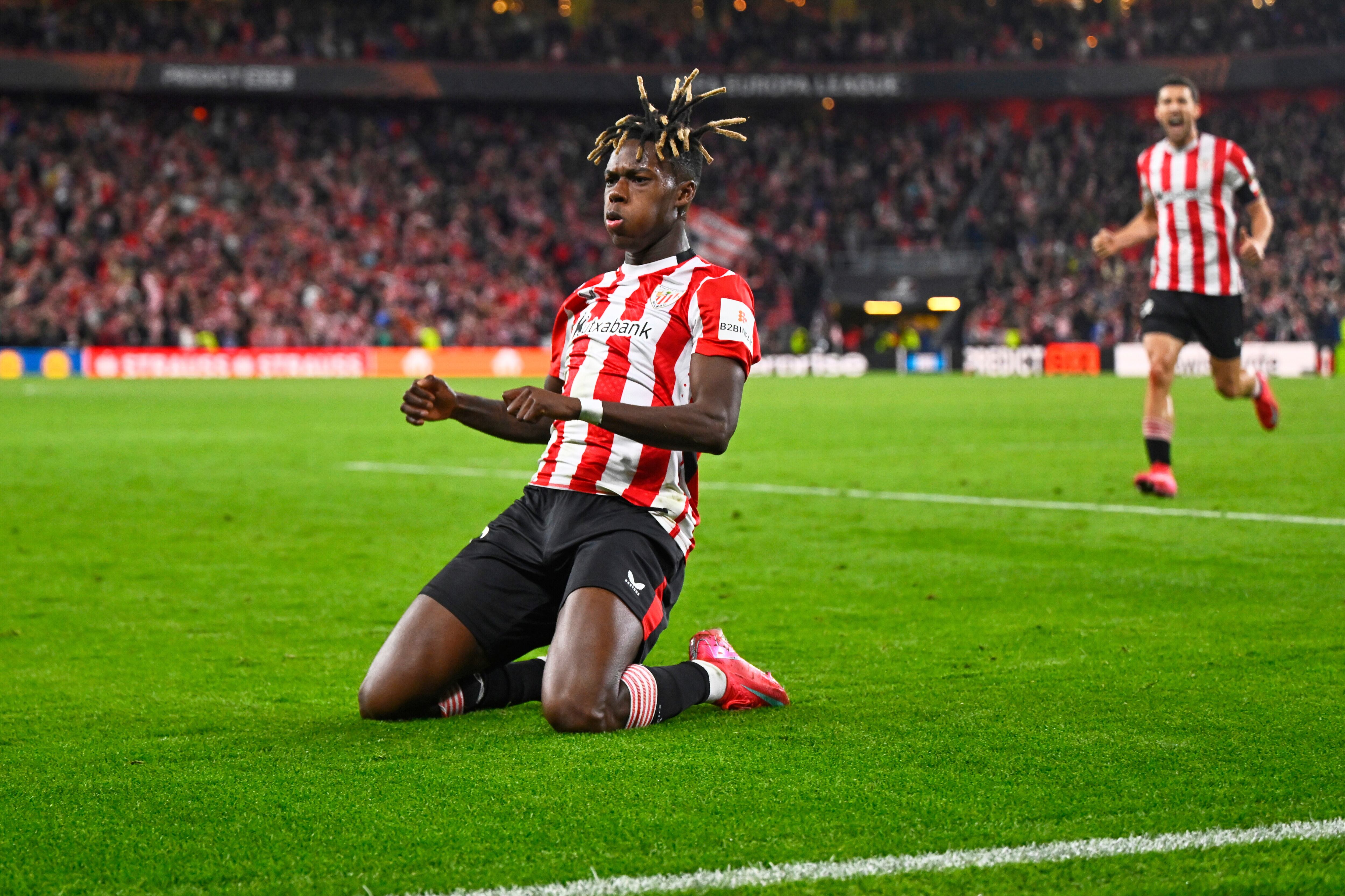 Athletic Bilbao's Nico Williams celebrates after scoring his side's opening goal during the Europa League round of 16 second leg soccer match between Athletic Bilbao and AS Roma at the San Mames stadium in Bilbao, Spain, Thursday, March 13, 2025. (AP Photo/Miguel Oses)
