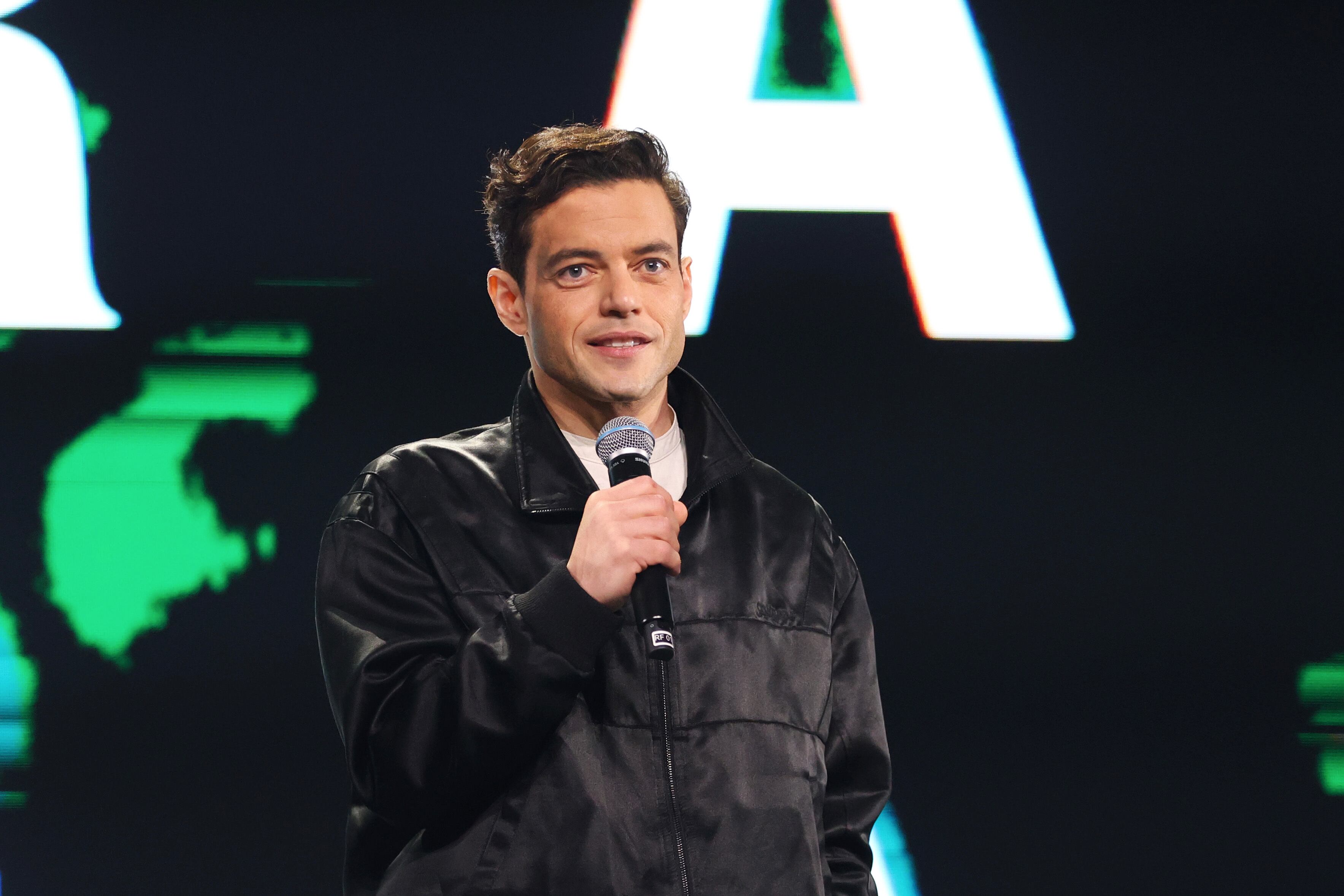 Rami Malek, The Amateur actor, speaks on stage during Day 2 of the D23 Brazil: A Disney Experience at Transamerica Expo Center on November 09, 2024 in Sao Paulo, Brazil.  (Photo by Ricardo Moreira/Getty Images for Disney)
