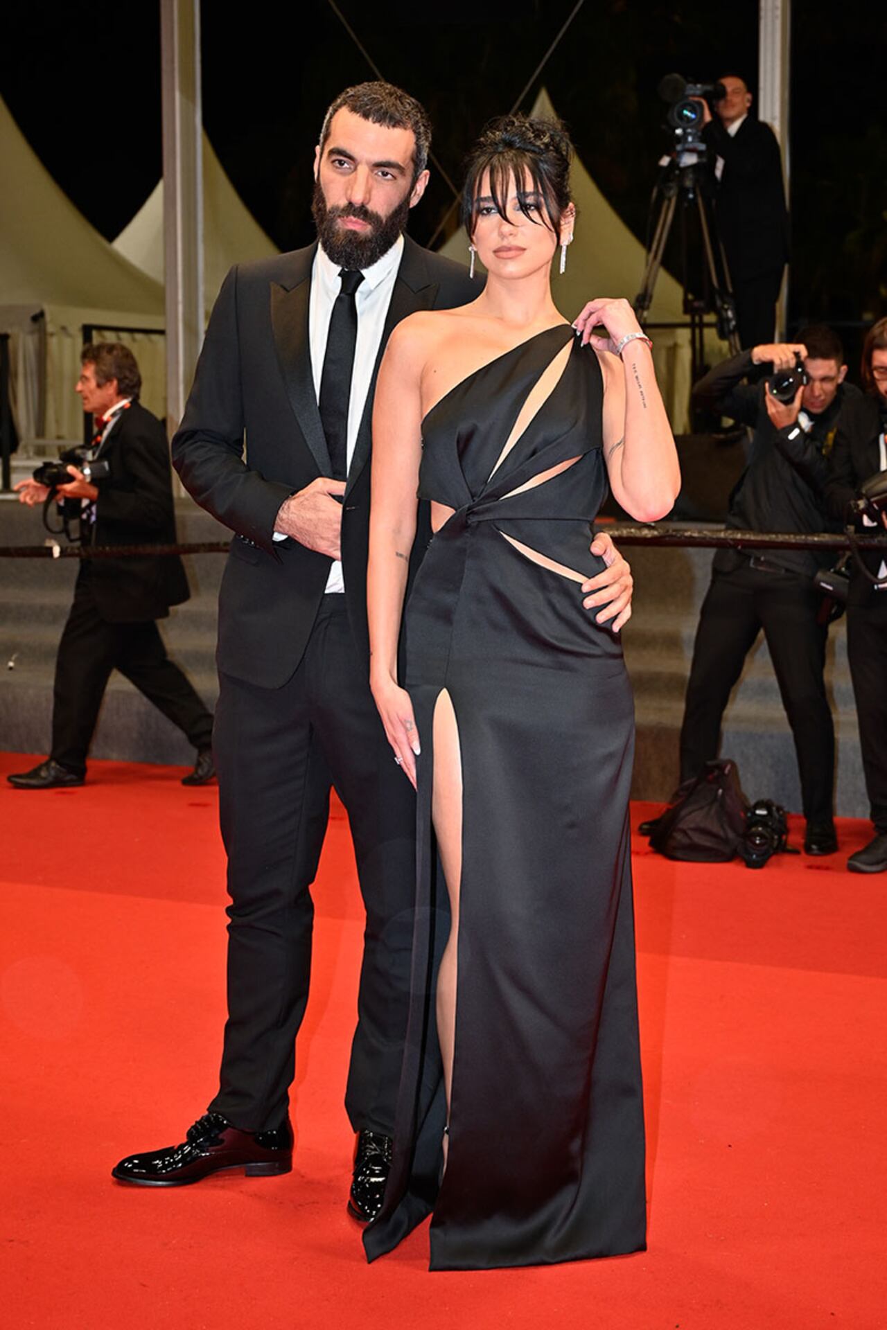 CANNES, FRANCE - MAY 19: Dua Lipa and Romain Gavras attend the "Omar La Fraise (The King of Algiers)" red carpet during the 76th annual Cannes film festival at Palais des Festivals on May 19, 2023 in Cannes, France. (Photo by Stephane Cardinale - Corbis/Corbis via Getty Images)