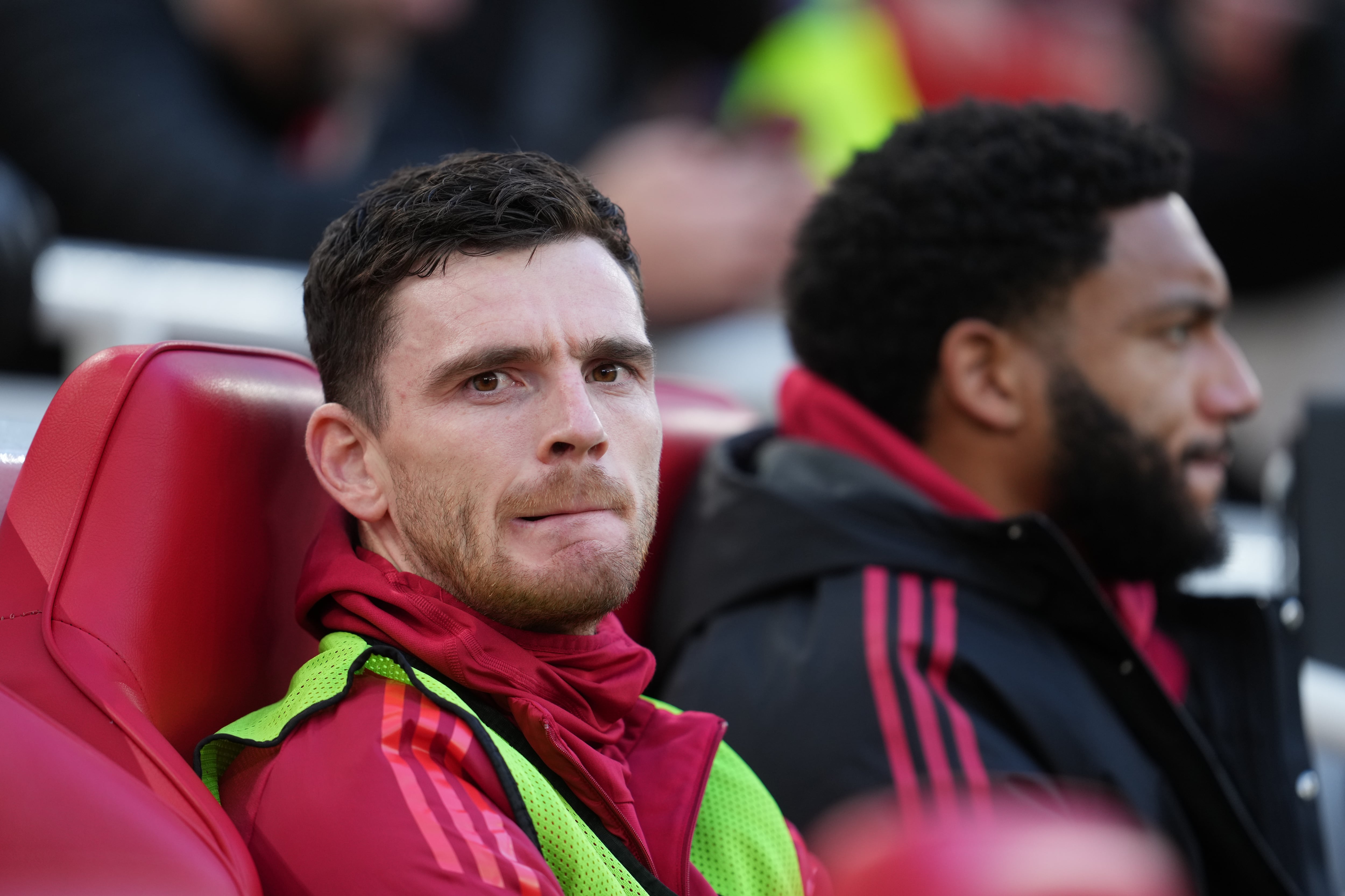 Liverpool's Andrew Robertson sits on the bench prior to the English Premier League soccer match between Liverpool and Burnley in Liverpool, England, Saturday, Jan. 17, 2026. (AP Photo/Jon Super)