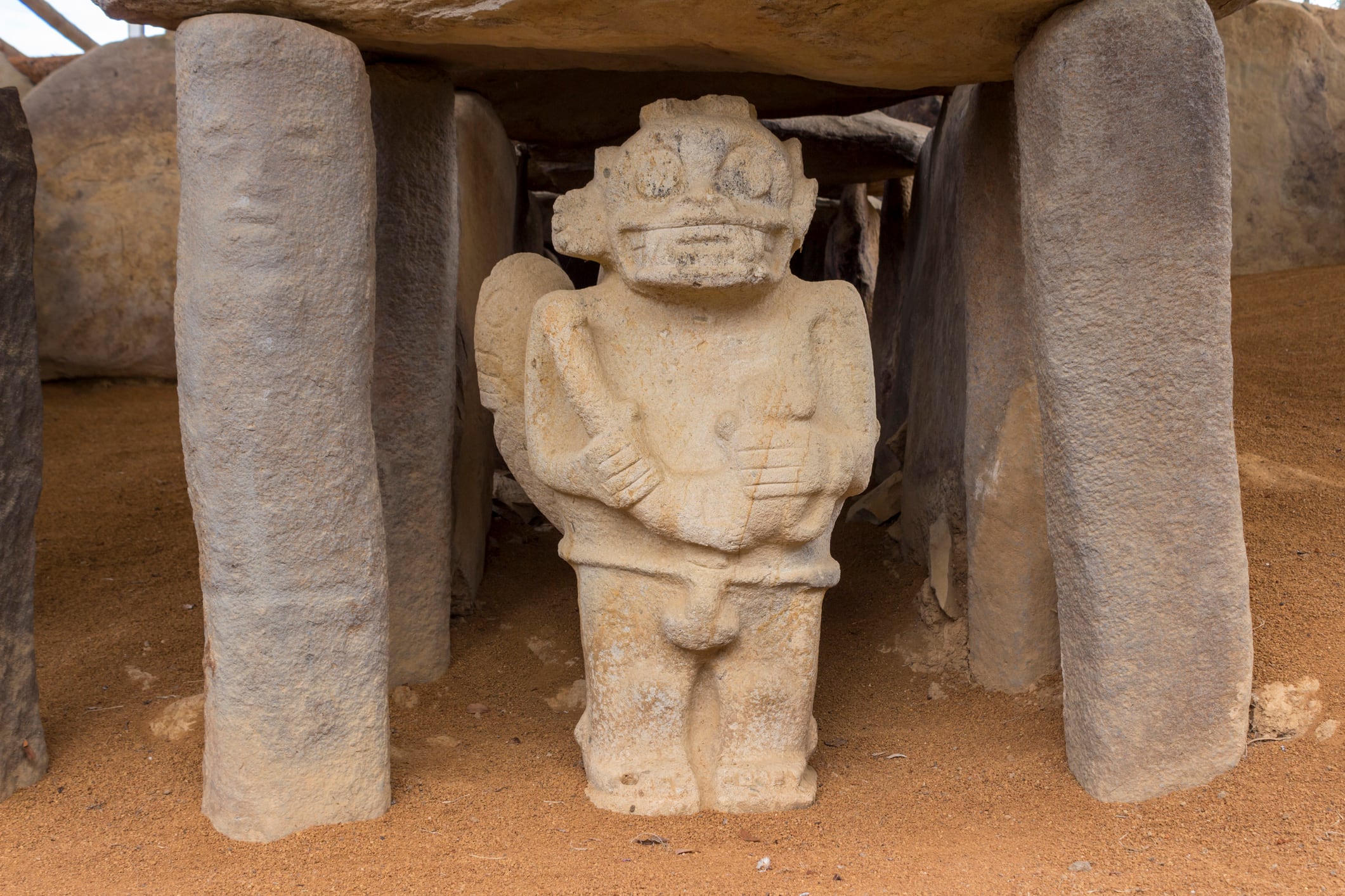 San Agustin (San Agustín), Huila, Colombia : pre-columbian megalithic sculptures in the archaeological park. Impressive megaliths carved with volcanic stone. Gardians of the dead resting in the tomb.