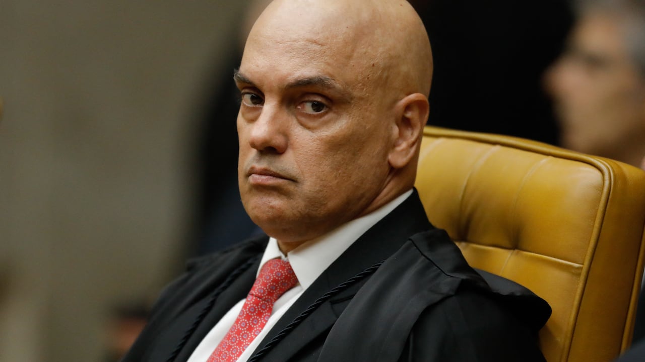 (FILES) Brazilian Supreme Court judge Alexandre de Moraes attends the solemn opening session of the 2024 judicial year in Brasilia on February 1, 2024. A Supreme Court judge in Brazil ordered an investigation of Elon Musk on April 7, 2024, after the mogul criticized the magistrate and accused him of censorship for blocking accounts suspected of spreading disinformation. In an order seen by AFP, Judge Alexandre de Moraes accused the owner of X, formerly Twitter, of "criminal instrumentalization of X." (Photo by Sergio Lima / AFP)