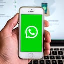 SPAIN - 2021/03/31: In this photo illustration, the WhatsApp app seen displayed on a smartphone screen and a WhatsApp Web on a laptop in the background. (Photo Illustration by Thiago Prudêncio/SOPA Images/LightRocket via Getty Images)