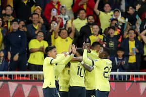 Ecuador's Angel Mena, not seen, celebrates with teammates after scoring the opening goal against Chile during a qualifying soccer match for the FIFA World Cup 2026 at Rodrigo Paz Delgado Stadium in Quito, Ecuador, Tuesday, Nov. 21, 2023.(AP Photo/Patricio Teran)