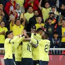 Ecuador's Angel Mena, not seen, celebrates with teammates after scoring the opening goal against Chile during a qualifying soccer match for the FIFA World Cup 2026 at Rodrigo Paz Delgado Stadium in Quito, Ecuador, Tuesday, Nov. 21, 2023.(AP Photo/Patricio Teran)