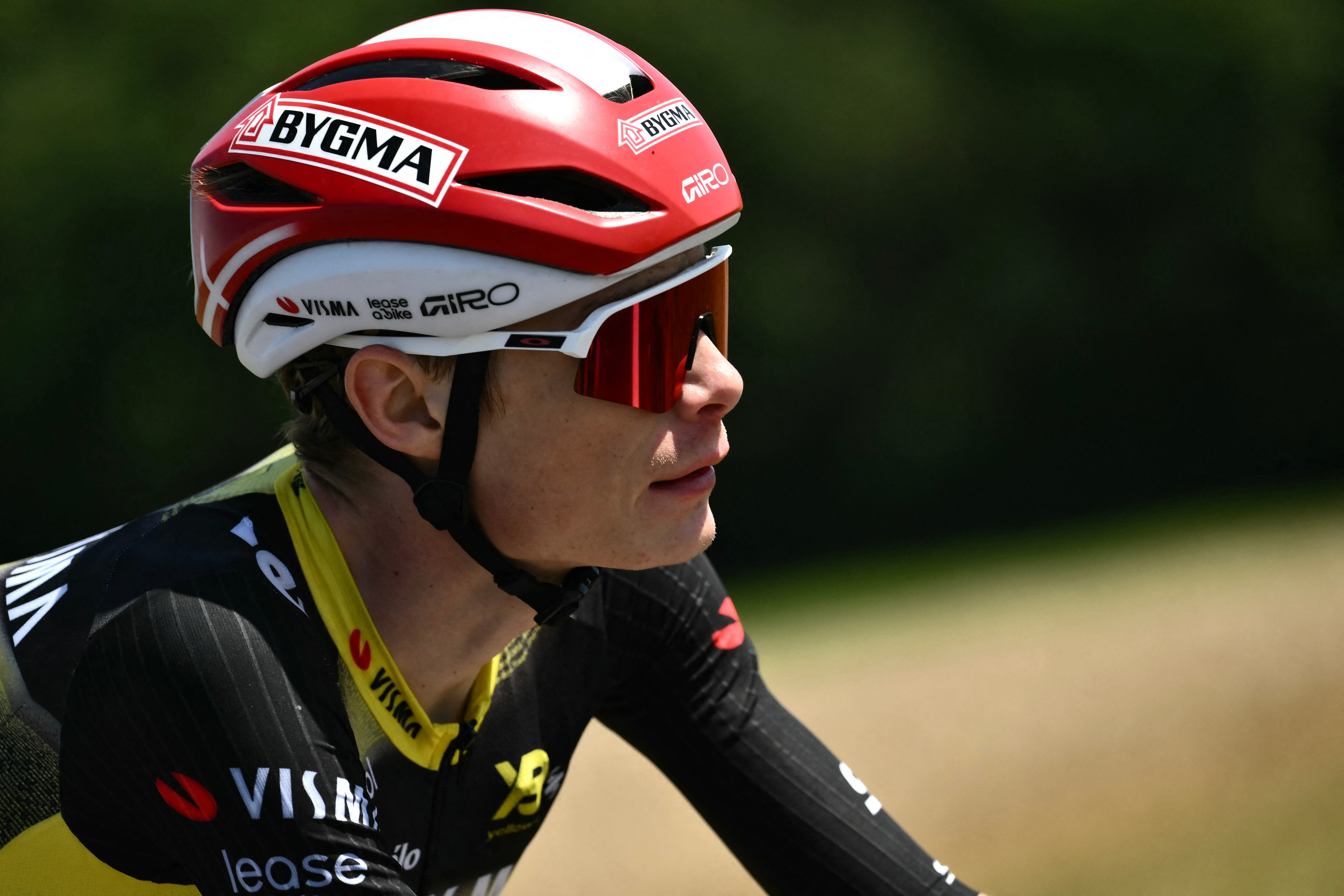 Team Visma - Lease a bike team's Danish rider Jonas Vingegaard cycles during the 4th stage of the 112th edition of the Tour de France cycling race, 174.2 km between Amiens Metropole and Rouen, Northern France, on July 8, 2025. (Photo by Marco BERTORELLO / AFP)