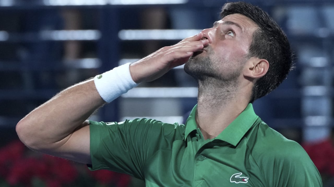 Serbia's Novak Djokovic celebrates after he got a point against Russia's Karen Khachanov during a match of the Dubai Duty Free Tennis Championship in Dubai, United Arab Emirates, Wednesday, Feb. 23, 2022. (AP/Ebrahim Noroozi)