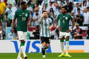 Argentina's Lionel Messi, center, celebrates after he scored the opening goal from the penalty spot during the World Cup group C soccer match between Argentina and Saudi Arabia at the Lusail Stadium in Lusail, Qatar, Tuesday, Nov. 22, 2022. (AP Photo/Natacha Pisarenko)