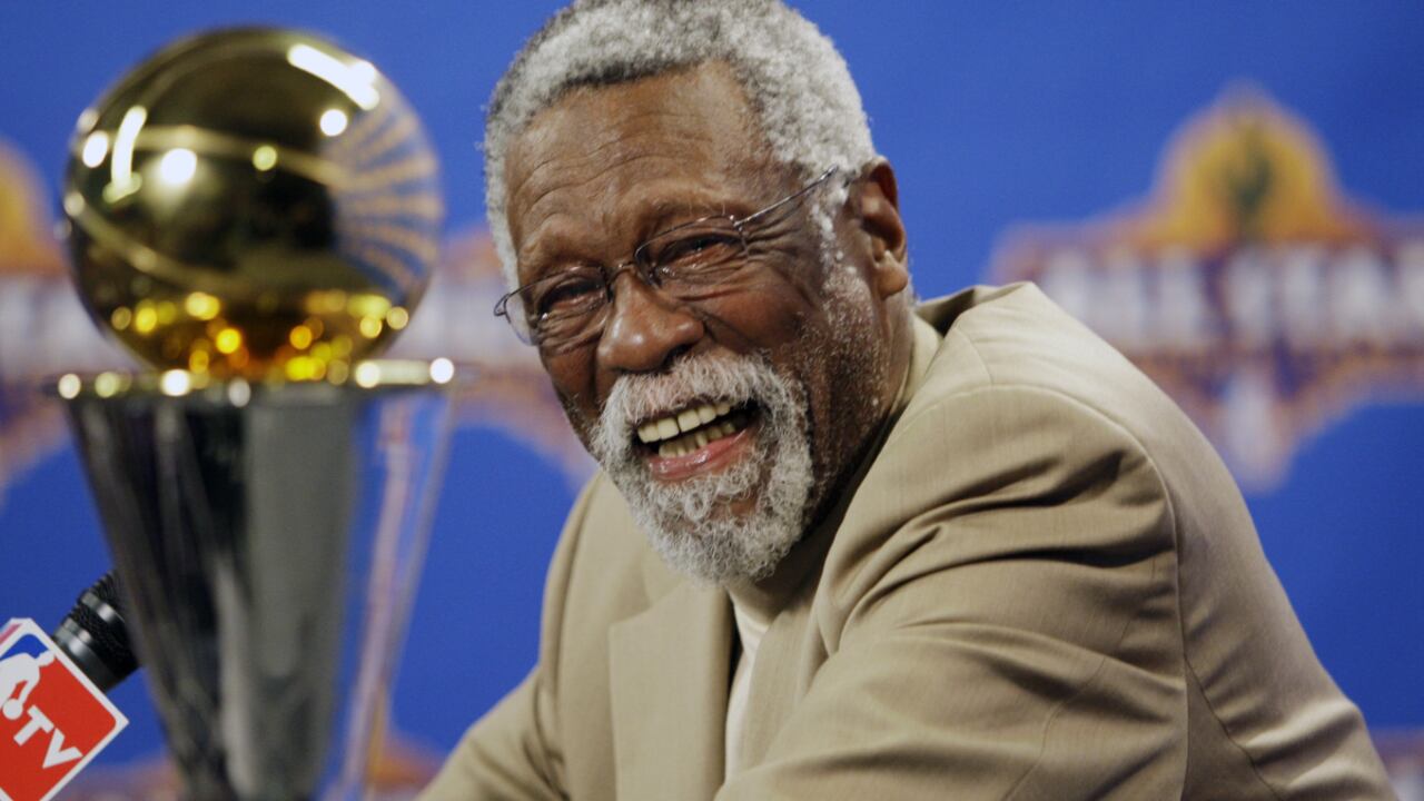 FILE - NBA great Bill Russell reacts at a news conference as he learns the most valuable player award for the NBA basketball championships has been renamed the Bill Russell NBA Finals Most Valuable Player Award, Feb. 14, 2009, in Phoenix. Russell has died at age 88. His family said on social media that Russell died on Sunday, July 31, 2022. Russell anchored a Boston Celtics dynasty that won 11 titles in 13 years. (AP/Matt York, file)