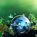 Green energy for clean and sustainable environment. Wind energy used in the industry of factories, machines and technologies. Reducing Co2 emissions and limiting global warming and climate change.