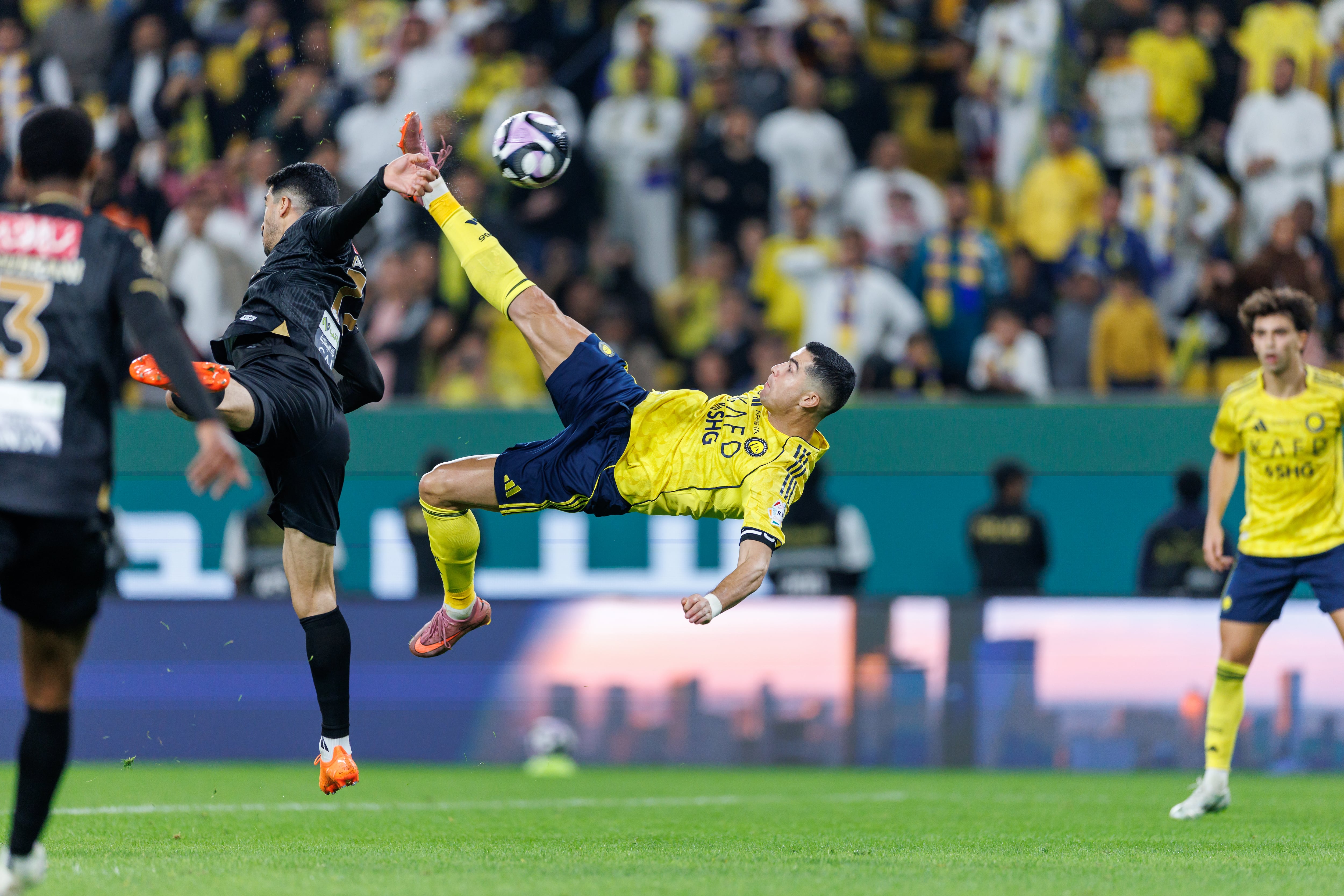 RIYADH, SAUDI ARABIA - NOVEMBER 23: Cristiano Ronaldo of team Al-Nassr FC scores their fourth goal during the Saudi Pro League match between Al Nassr and Al Khaleej at Al Awwal Park on November 23, 2025 in Riyadh, Saudi Arabia. (Photo by Abdullah Ahmed/Getty Images)