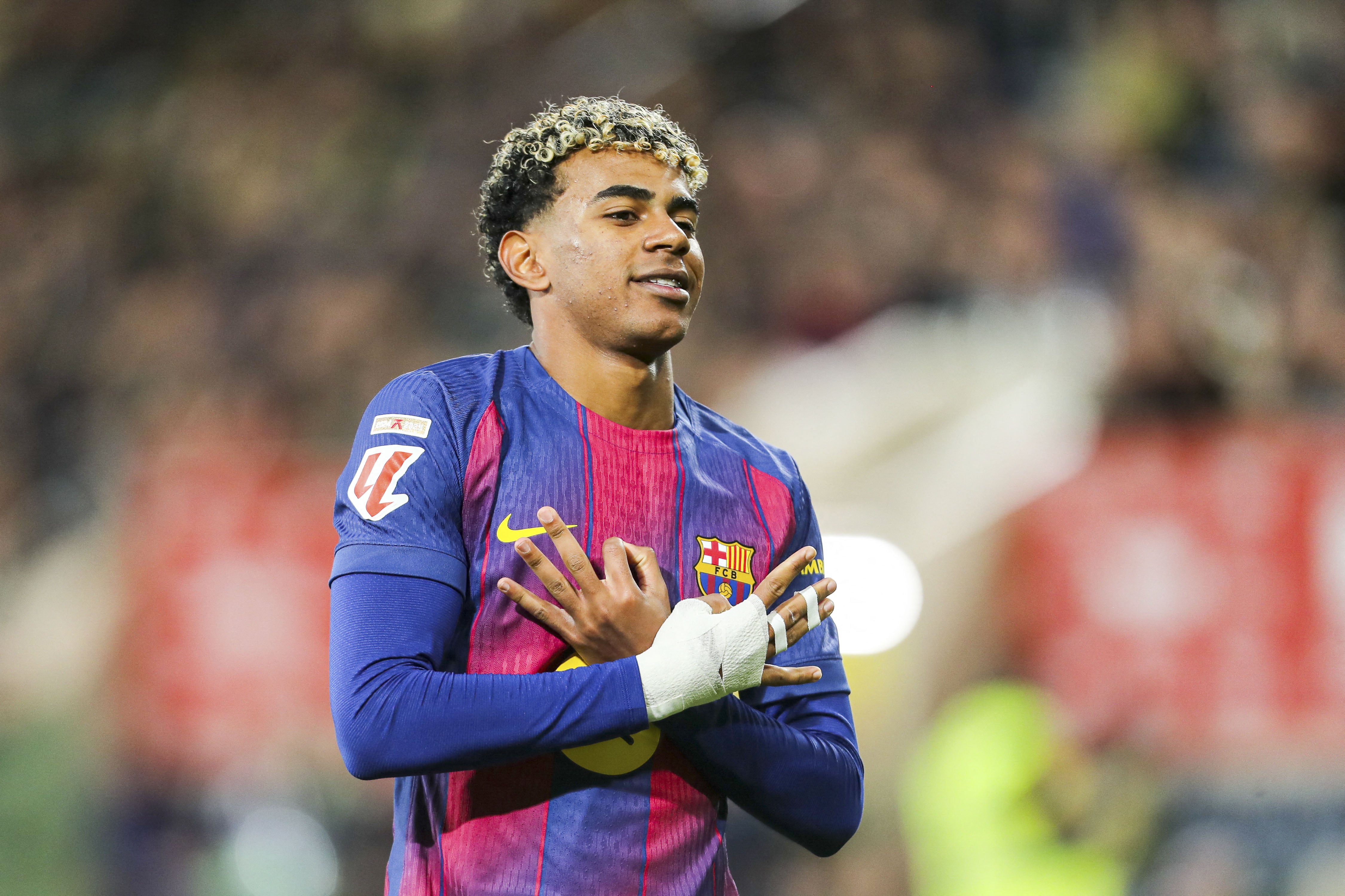 Lamine Yamal of FC Barcelona celebrates his goal during the Spanish championship LaLiga football match between Villarreal CF and FC Barcelona on 21 December 2025 at Estadio de la Cer�mica in Vila-real, Spain - Photo Francisco Macia / Spain DPPI / DPPI (Photo by Francisco Macia / Spain DPPI / DPPI via AFP)