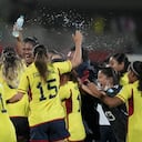 Colombia's players react after winning 1-0 against Argentina at the end of a women's Copa America semi final soccer match in Bucaramanga, Colombia , Monday, July 25, 2022. (AP Photo/Dolores Ochoa)