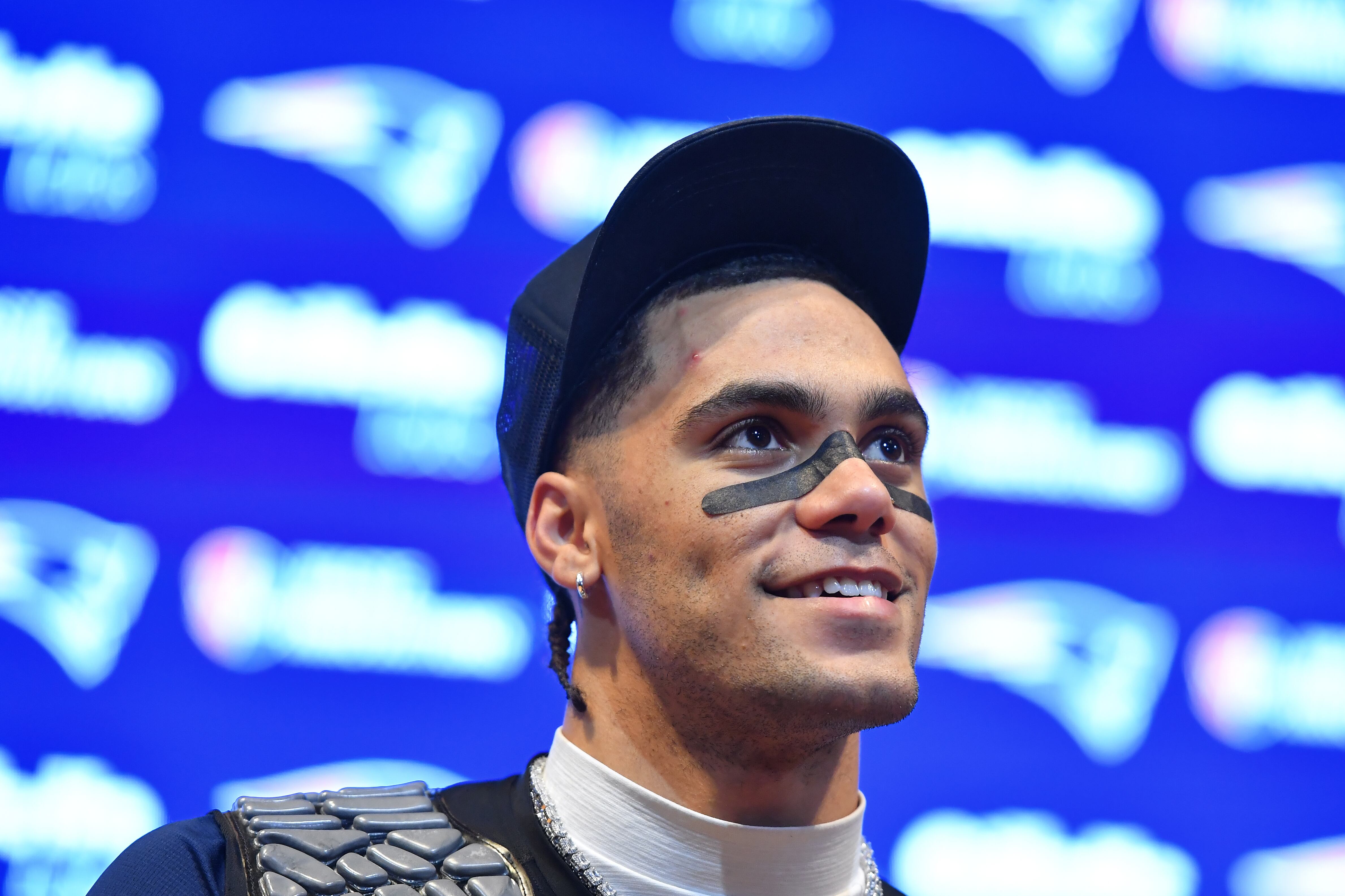 New England Patriots cornerback Christian Gonzalez speaks at a news conference after an NFL divisional playoff football game against the Houston Texans, Sunday, Jan. 18, 2026, in Foxborough, Mass. (AP Photo/Steven Senne)