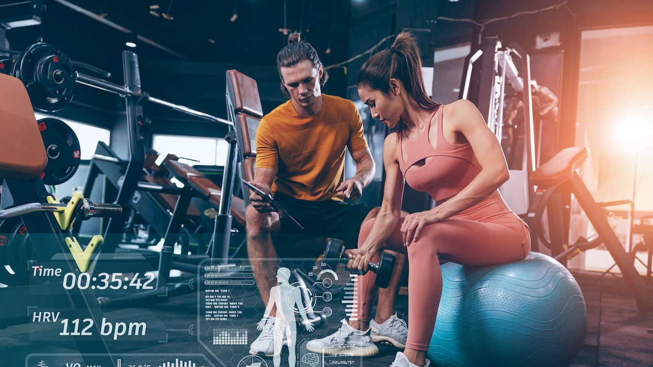 Modern technology in sport science concept. muscle strength training people in sport club overlay data chart body analysis diagram interface.