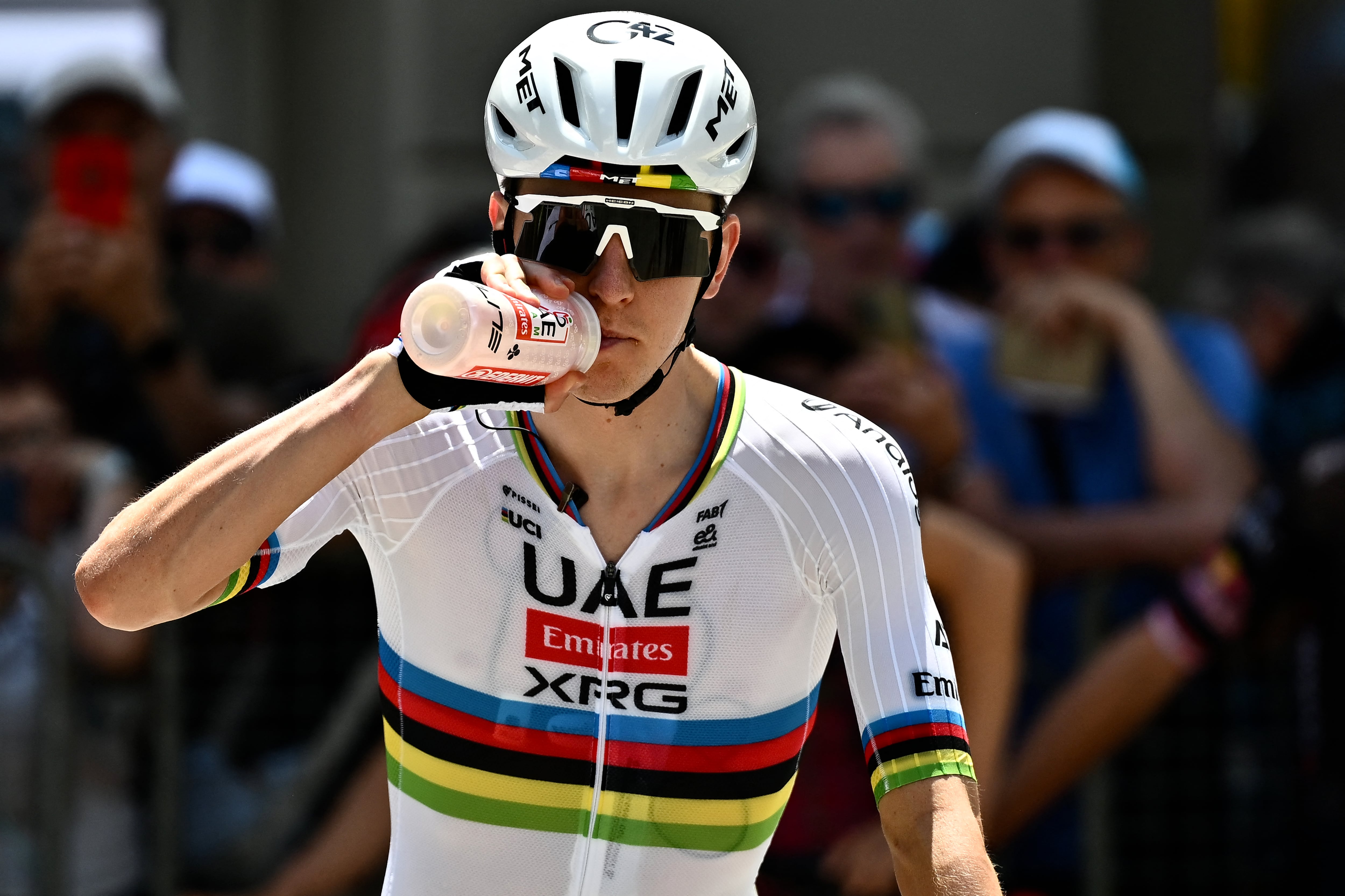 Slovenia's rider Tadej Pogacar of team UAE Emirates - XRG prepares to take the start of the first stage of the Men's Tour of Switzerland (Tour de Suisse) cycling race, in Sondrio, Italy, on June 17, 2026. (Photo by Marco BERTORELLO / AFP)