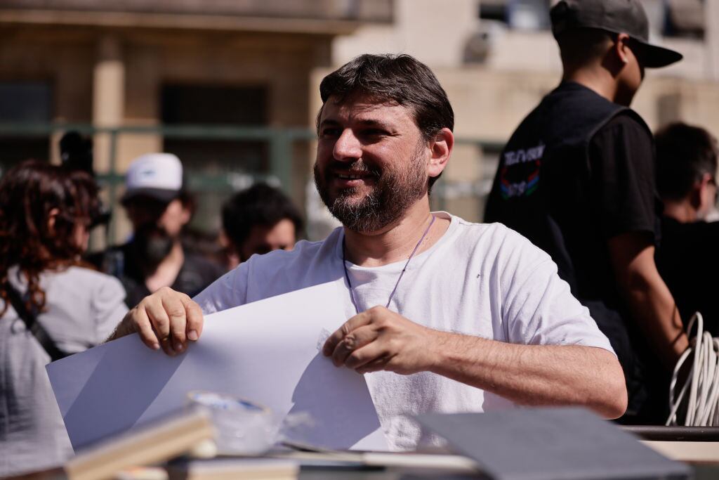 BUENOS AIRES, ARGENTINA - NOVEMBER 13: A social leader and former Union for the Homeland candidate Juan Grabois is seen as he attends a demonstration outside the Federal Courts where he held an open class during the ongoing trial involving former Argentine president Cristina Fernandez de Kirchner in Buenos Aires, Argentina on November 13, 2024. The event coincided with the delivery of a ruling by a cassation court in the case involving former President Cristina Fernandez de Kirchner. (Photo by Luciano Gonzalez/Anadolu via Getty Images)