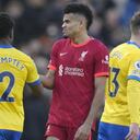 Liverpool's Luis Diaz, right, cheers with Brighton's Tariq Lamptey at the end of the English Premier League soccer match between Brighton and Hove Albion and Liverpool at the Amex stadium in Brighton, England, Saturday, March 12, 2022. Liverpool won 2-0. (AP Photo/Kirsty Wigglesworth)