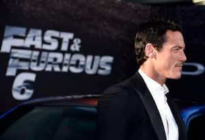 UNIVERSAL CITY, CA - MAY 21: Actor Luke Evans arrives at the Premiere Of Universal Pictures' "Fast & Furious 6" on May 21, 2013 in Universal City, California. (Photo by Frazer Harrison/Getty Images)