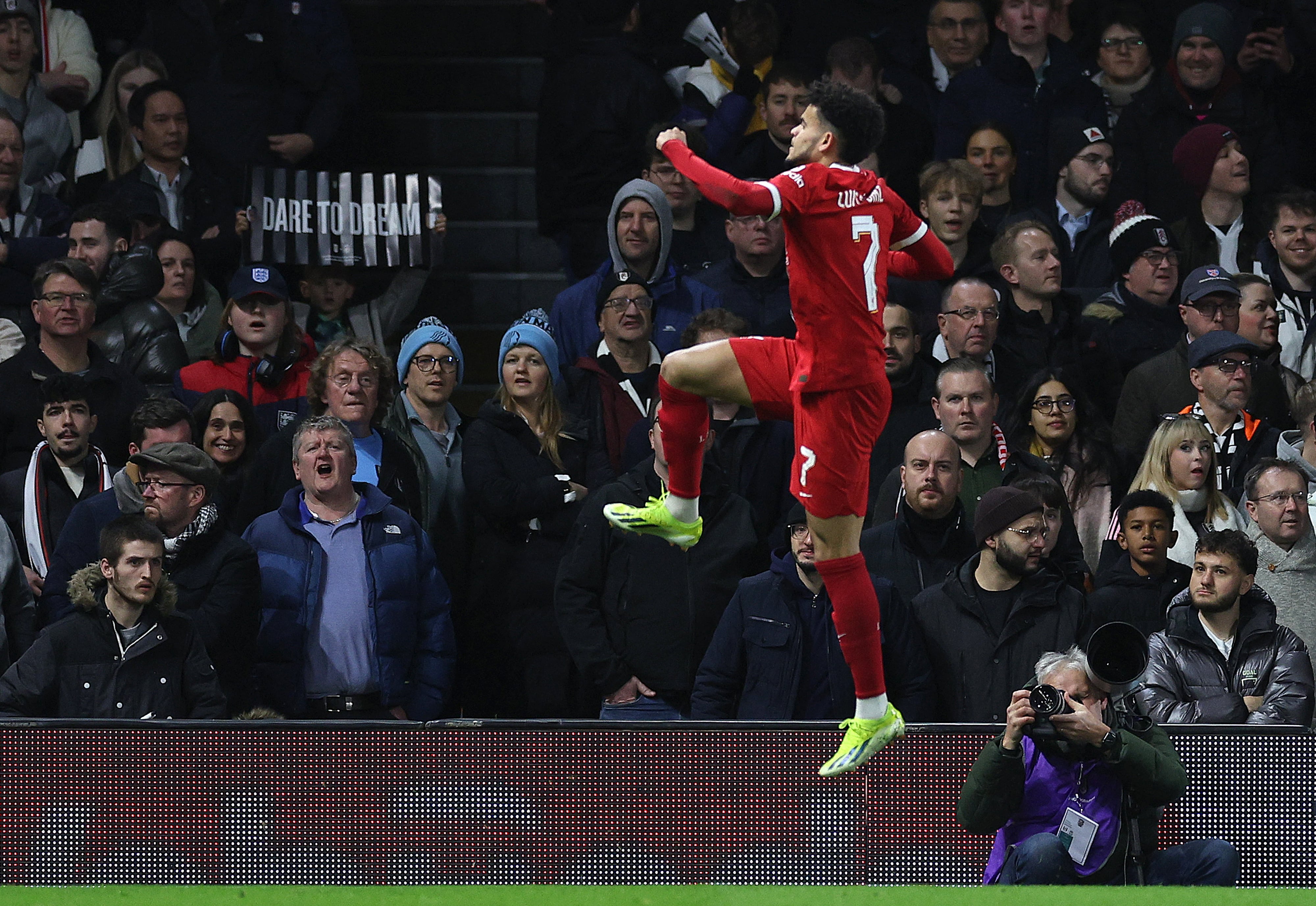 Liverpool's Colombian midfielder #07 Luis Diaz celebrates scoring the opening goal during the English League Cup demi-final second leg football match between Fulham and Liverpool at Craven Cottage stadium, in London, on January 24, 2024. (Photo by Adrian DENNIS / AFP) / RESTRICTED TO EDITORIAL USE. No use with unauthorized audio, video, data, fixture lists, club/league logos or 'live' services. Online in-match use limited to 120 images. An additional 40 images may be used in extra time. No video emulation. Social media in-match use limited to 120 images. An additional 40 images may be used in extra time. No use in betting publications, games or single club/league/player publications. /