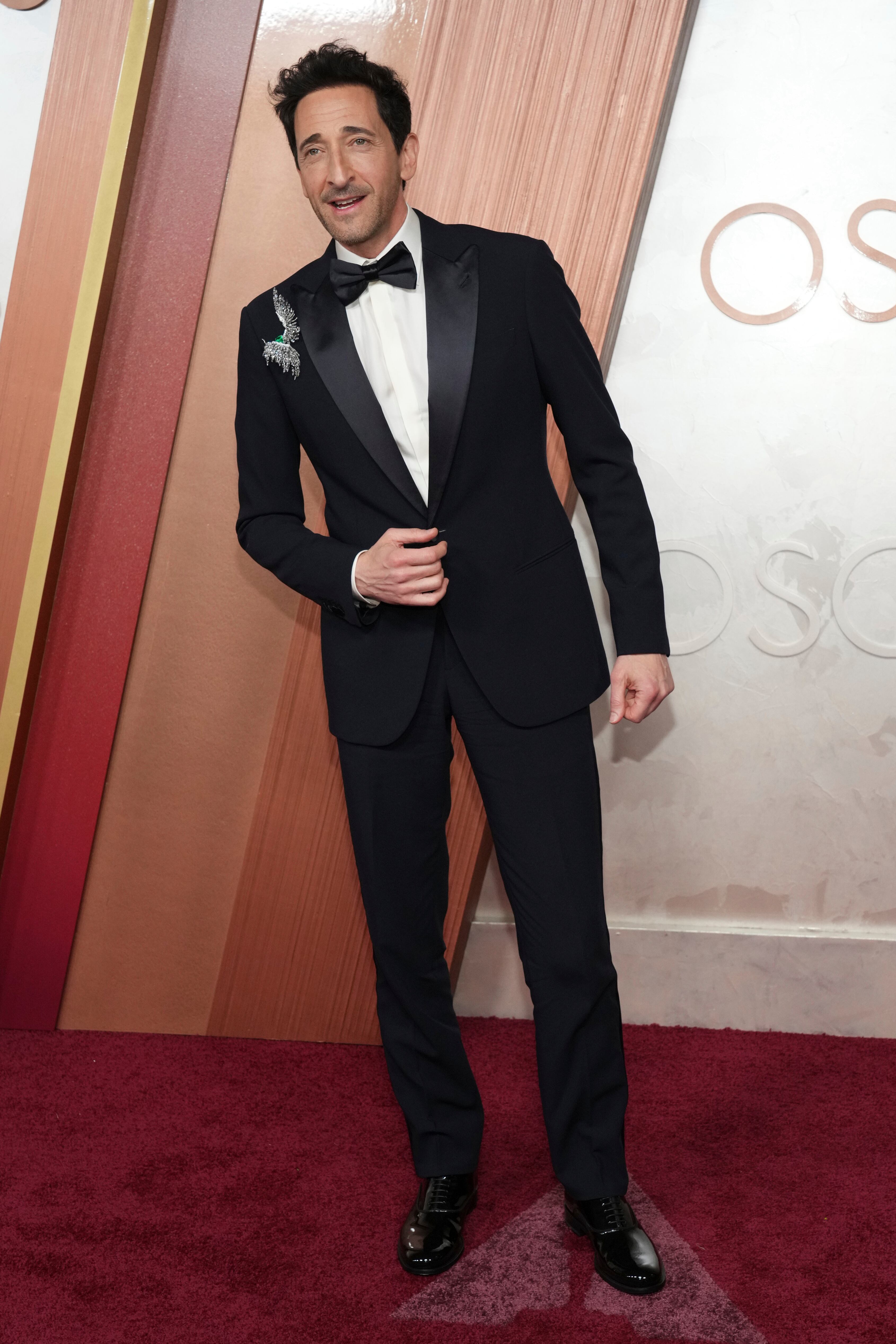 Adrien Brody arrives at the Oscars on Sunday, March 2, 2025, at the Dolby Theatre in Los Angeles. (Photo by Jordan Strauss/Invision/AP)