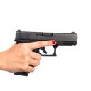 young woman asian girl holding a gun aiming at the gun white background