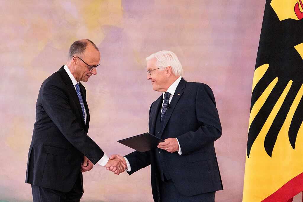 BERLIN, GERMANY - MAY 6: Chancellor Friedrich Merz receives his official commissioning document from German President Frank-Walter Steinmeier at Schloss Bellevue on May 6, 2025 in Berlin, Germany. The new government is a coalition of Christian Democrats (CDU/CSU) and Social Democrats (SPD). (Photo by Carsten Koall/Getty Images)x