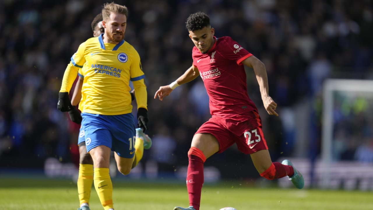 Liverpool's Luis Diaz, right, challenges for the ball with Brighton's Alexis Mac Allister during the English Premier League soccer match between Brighton and Hove Albion and Liverpool at the Amex stadium in Brighton, England, Saturday, March 12, 2022. (AP/Kirsty Wigglesworth)