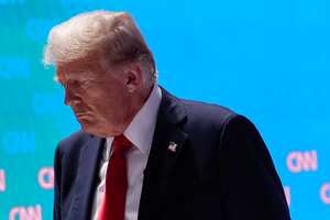 Republican presidential candidate former President Donald Trump walks off stage during a commercial break in a presidential debate with President Joe Biden, Thursday, June 27, 2024, in Atlanta. (AP Photo/Gerald Herbert)