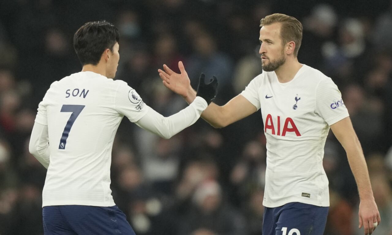Tottenham's Son Heung-min, left, celebrates with Tottenham's Harry Kane after scoring his side's second goal during the English Premier League soccer match between Tottenham Hotspur and Liverpool at the Tottenham Hotspur Stadium in London, Sunday, Dec. 19, 2021. (AP/Frank Augstein)