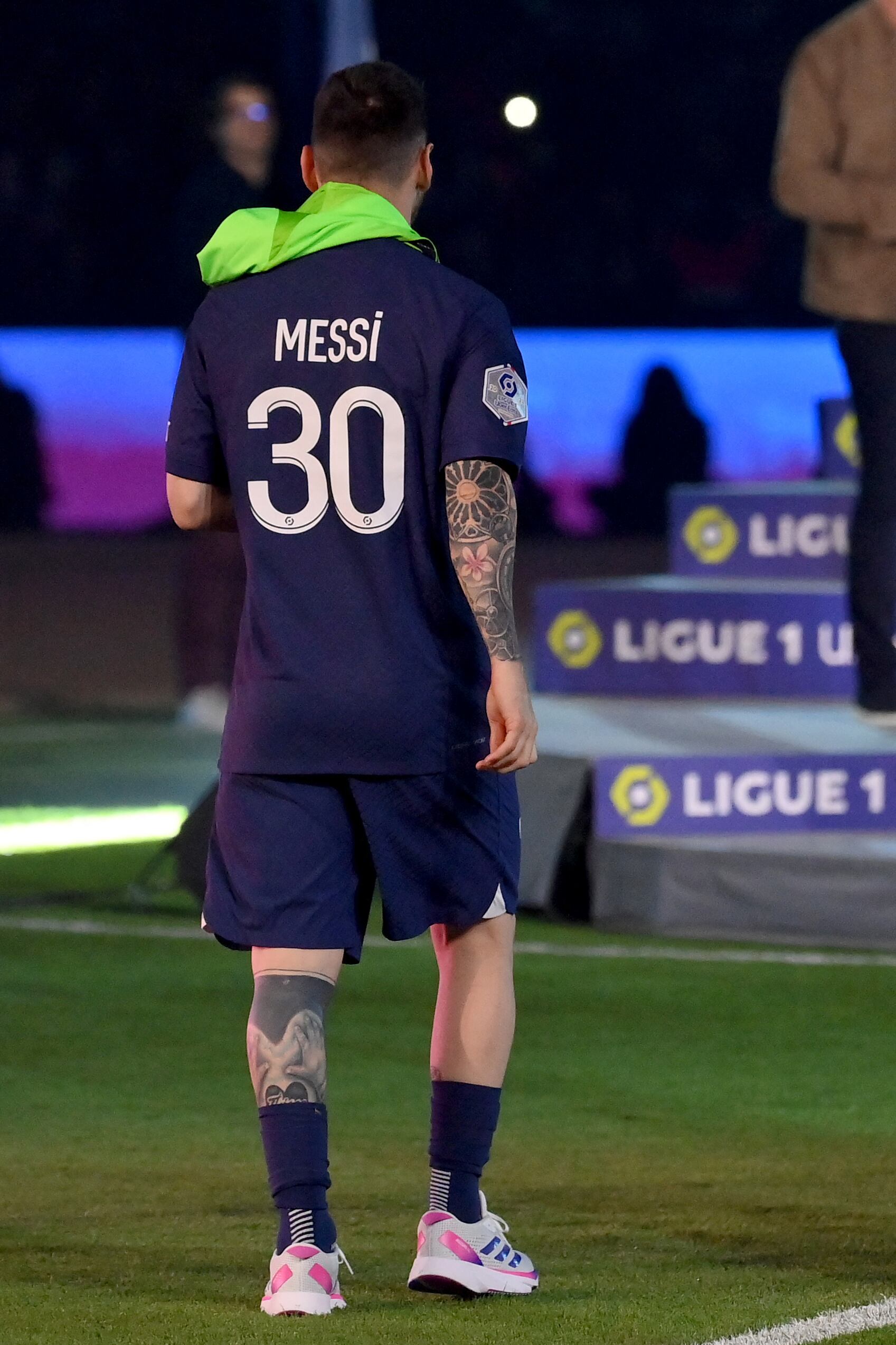 Paris Saint-Germain's Argentine forward Lionel Messi walks towards winners stand during the 2022-2023 Ligue 1 championship trophy ceremony following the L1 football match between Paris Saint-Germain (PSG) and Clermont Foot 63 at the Parc des Princes Stadium in Paris on June 3, 2023. (Photo by FRANCK FIFE / AFP)