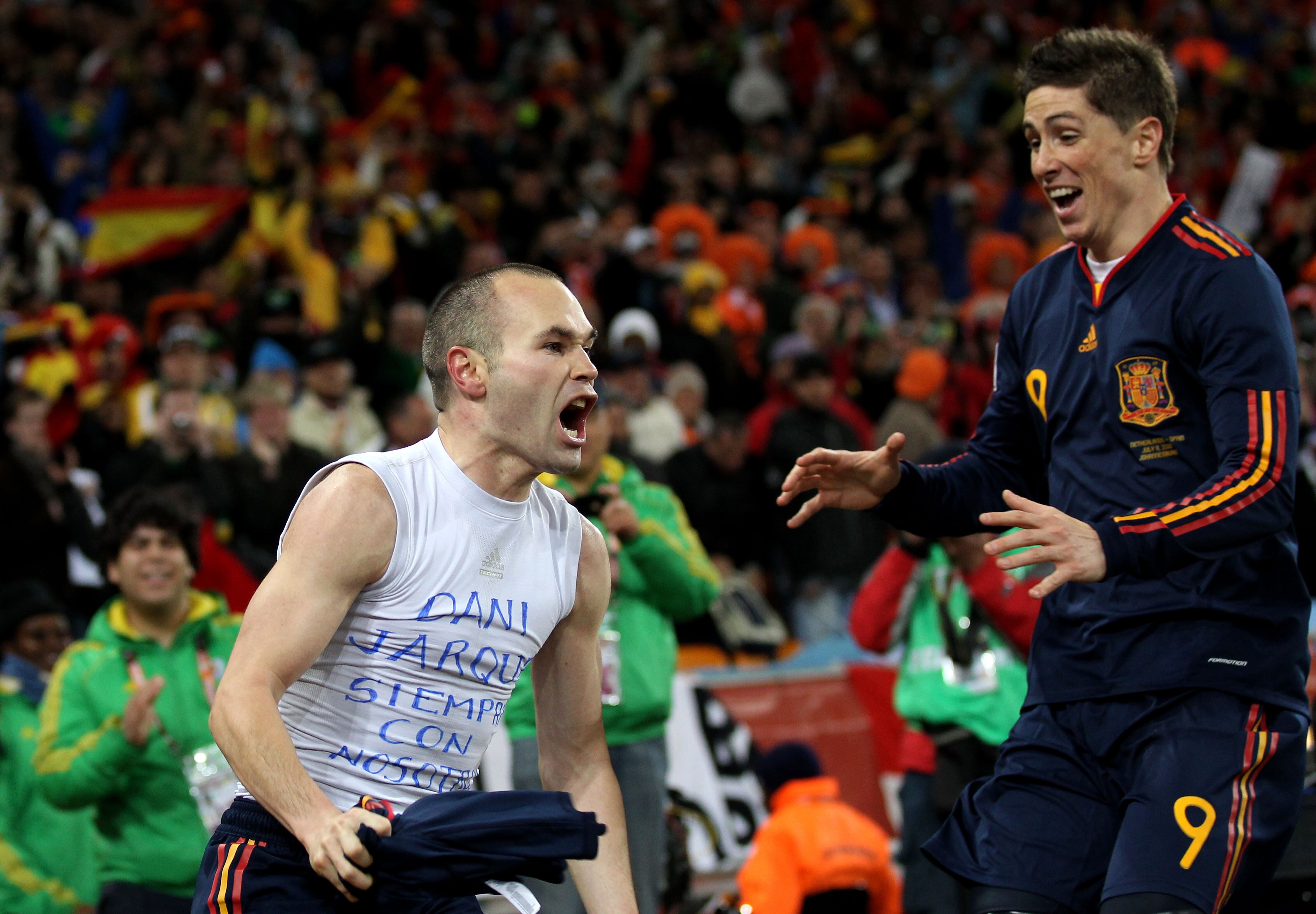 JOHANNESBURG, SOUTH AFRICA - JULY 11:  Andres Iniesta of Spain celebrates scoring during the 2010 FIFA World Cup South Africa Final match between Netherlands and Spain at Soccer City Stadium on July 11, 2010 in Johannesburg, South Africa.  (Photo by Alex Livesey - FIFA/FIFA via Getty Images)