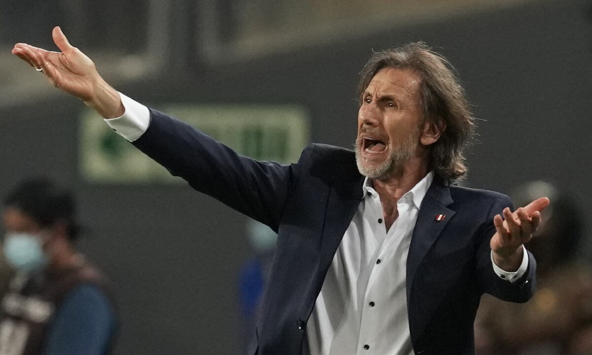 Peru's coach Ricardo Gareca reacts during a qualifying soccer match against Paraguay for the FIFA World Cup Qatar 2022 in Lima, Peru, Tuesday, March 29, 2022. (AP Photo/Martin Mejia)