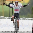 Patrick Konrad of Austria celebrates as he crosses the finish line to win the sixteenth stage of the Tour de France cycling race over 169 kilometers (105 miles) with start in Pas de la Case and finish in Saint Gaudens, France, Tuesday, July 13, 2021. (AP Photo/Daniel Cole)
