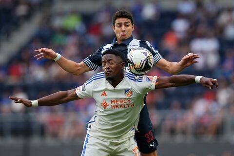 CINCINNATI, OHIO - JULY 31: Sergio Santos #17 of FC Cincinnati and Stefan Medina #33 of CF Monterrey jump for a header in the first half during the Leagues Cup Phase One match between CF Monterrey and FC Cincinnati at TQL Stadium on July 31, 2025 in Cincinnati, Ohio. (Photo by Dylan Buell - Leagues Cup/MLS via Getty Images)